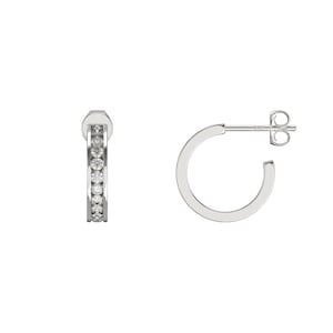 May include: A pair of silver hoop earrings. One earring features a row of small, clear stones. The other earring is a simple, polished silver hoop. Both earrings are set against a white background.