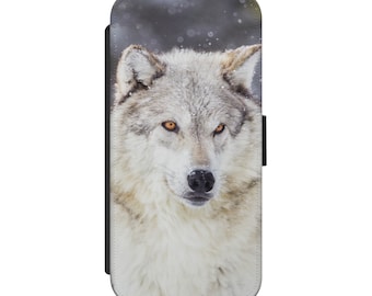 May include: A white wolf with yellow eyes stares intensely at the camera. The wolf is in a snowy forest setting.
