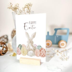 Simpatica cartolina di Pasqua con coniglietto per la famiglia e gli amici, allegra cartolina di auguri con coniglietto pasquale e uova di Pasqua colorate A6, cartolina per bambini
