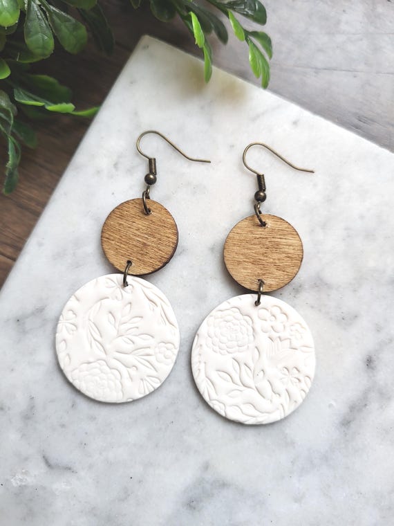 White Floral Stamped Clay Earrings.