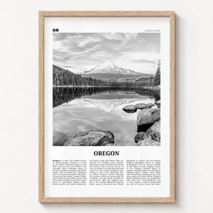 Oregon black and white poster print in a natural wood frame on a wall