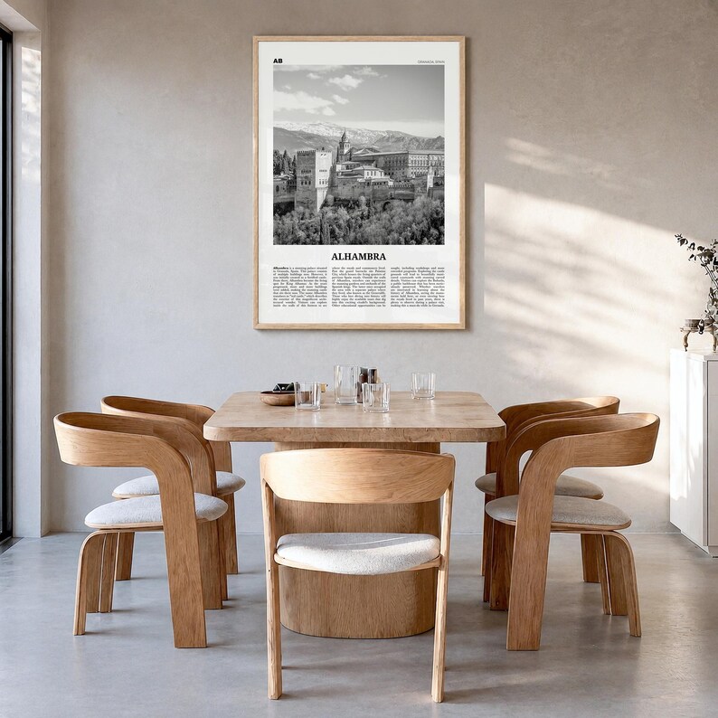 Alhambra Poster, black and white photo print in a natural wood frame, hanging in a dining room