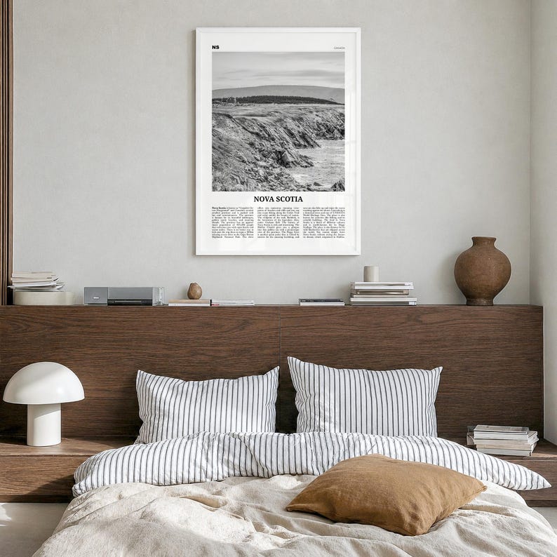 Nova Scotia Poster, black and white photo print in a white wood frame, hanging in a bedroom