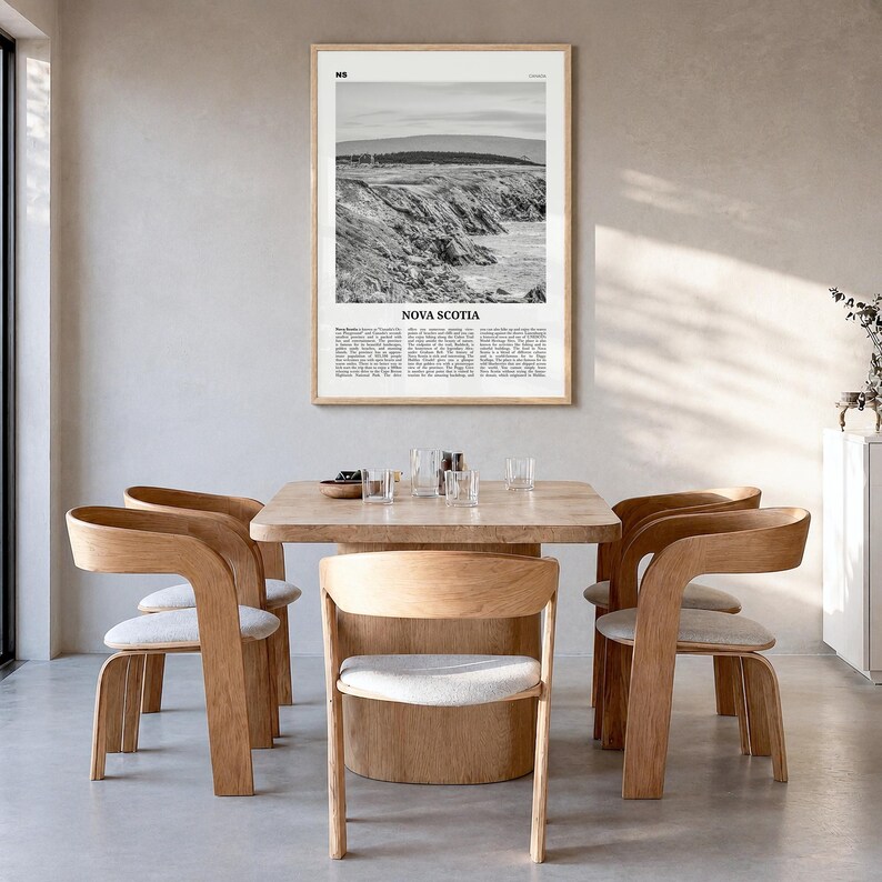 Nova Scotia Poster, black and white photo print in a natural wood frame, hanging in a dining room