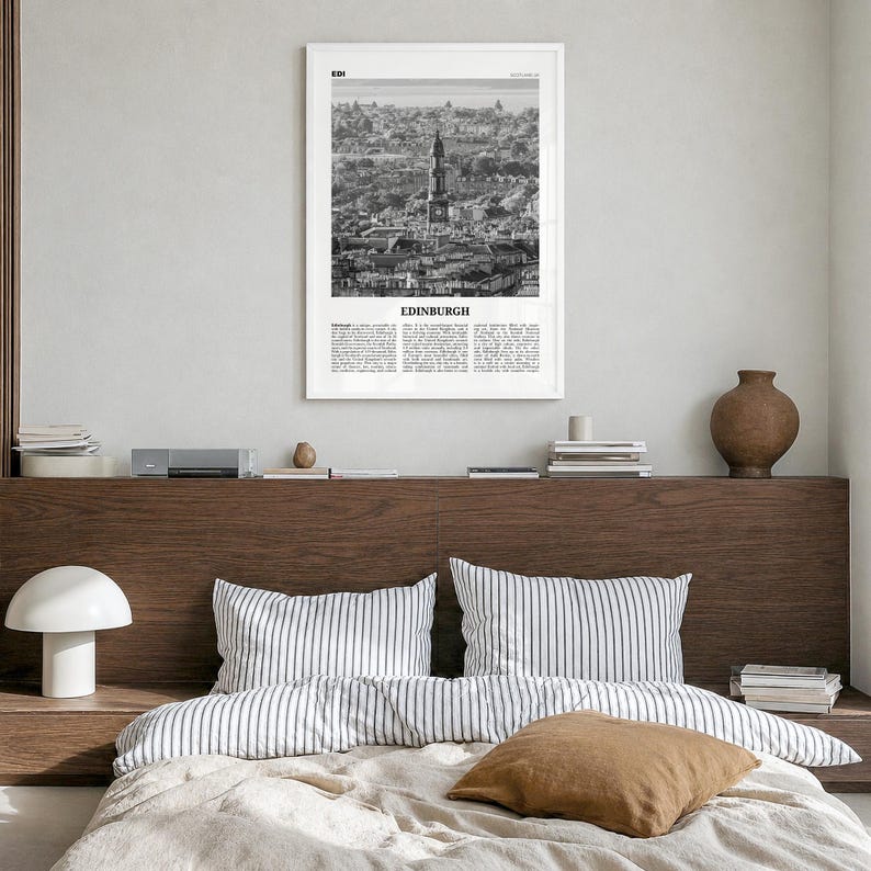 Edinburgh Poster, black and white photo print in a white wood frame, hanging in a bedroom