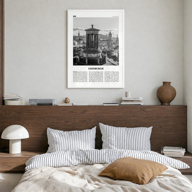 Edinburgh Poster, black and white monument photo print in a white wood frame, hanging in a bedroom