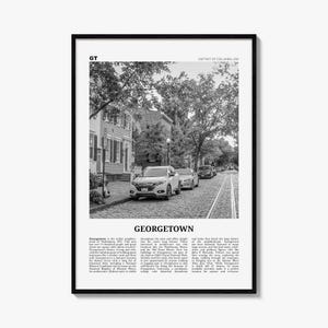 May include: A black and white framed wall art print featuring a street scene in Georgetown, Washington, D.C. The image shows a cobblestone road, parked cars, and trees. The text includes GT, District of Columbia, USA, and Georgetown, followed by a descriptive paragraph about the neighborhood's history and landmarks.
