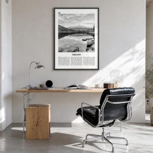 Oregon Poster, black and white lake photo print in a black wood frame, hanging in a bright home office