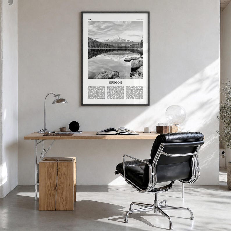 Oregon Poster, black and white lake photo print in a black wood frame, hanging in a bright home office