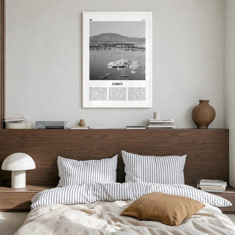 Corfu Poster, black and white photo print in a white wood frame, hanging in a bedroom