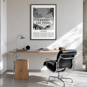 Las Vegas Poster, black and white palm photo print in a black wood frame, hanging in a bright home office
