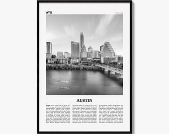 May include: A black and white framed wall art print featuring the Austin, Texas skyline. The image shows skyscrapers, a bridge, and a river with small boats. The text ATX, TEXAS USA, and AUSTIN appear alongside a descriptive paragraph about the city.