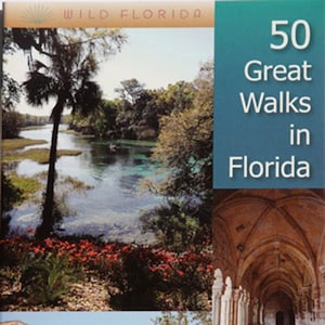 May include: Book cover with the title "50 Great Walks in Florida" by Lucy Beebe Tobias. The cover features three images: a lush green forest with a river, a brick building with arched doorways, and a view of a city street with cars.