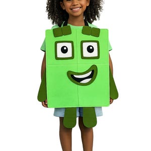 May include: A bright green rectangular costume featuring a cartoon face with two square eyes and a wide smiling mouth. The costume includes a matching green headband with a square block displaying the white number 4 on the front.