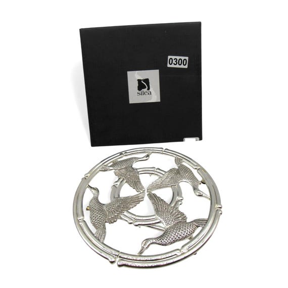 Dessous de plat extensible Silea en métal - motif Oie