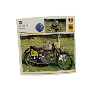 May include: A vintage FN 500 Grand Prix Motocross card from 1958, showing a silver motorcycle with the number 40 on a yellow background. The card includes a small image of a rider on a similar bike.