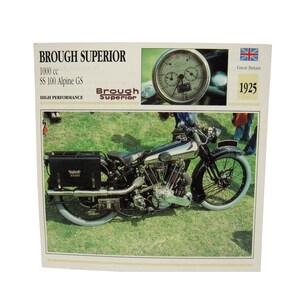May include: A vintage Brough Superior motorcycle, SS 100 Alpine GS model, from 1925. The motorcycle is black and silver with a black storage box. The image includes a close-up of the speedometer and the text "BROUGH SUPERIOR".