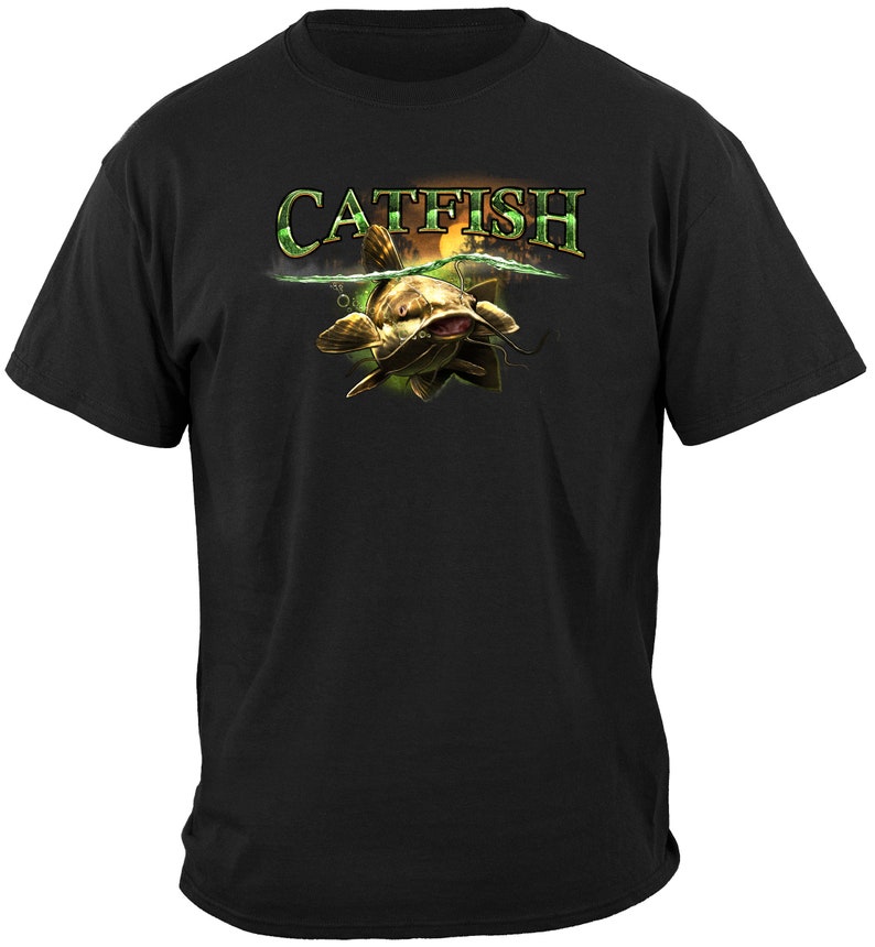 May include: Black t-shirt with a graphic of a catfish swimming in water with the word "CATFISH" above it.