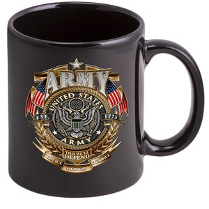 May include: Black ceramic coffee mug with a gold and silver United States Army logo. The logo features a bald eagle, a wreath, and the words "United States Army" and "Est. 1775". The mug also has the words "Service, Honor, Sacrifice, This We'll Defend".