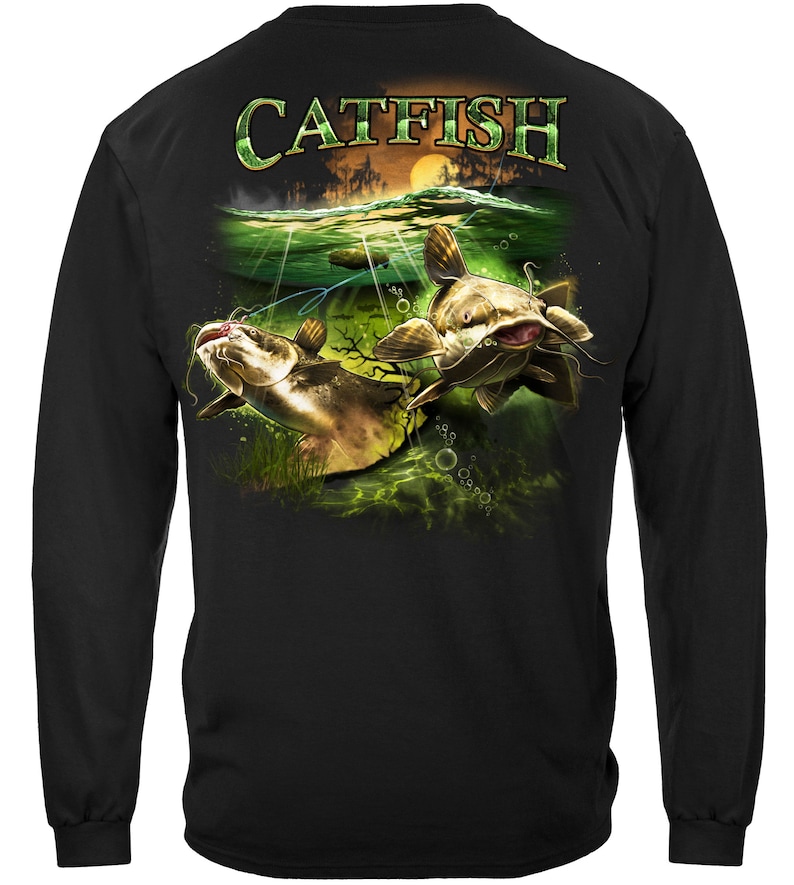 May include: Black long-sleeve t-shirt with a graphic print of two catfish swimming in a green and blue underwater scene. The text "CATFISH" is printed in white on the back of the shirt.