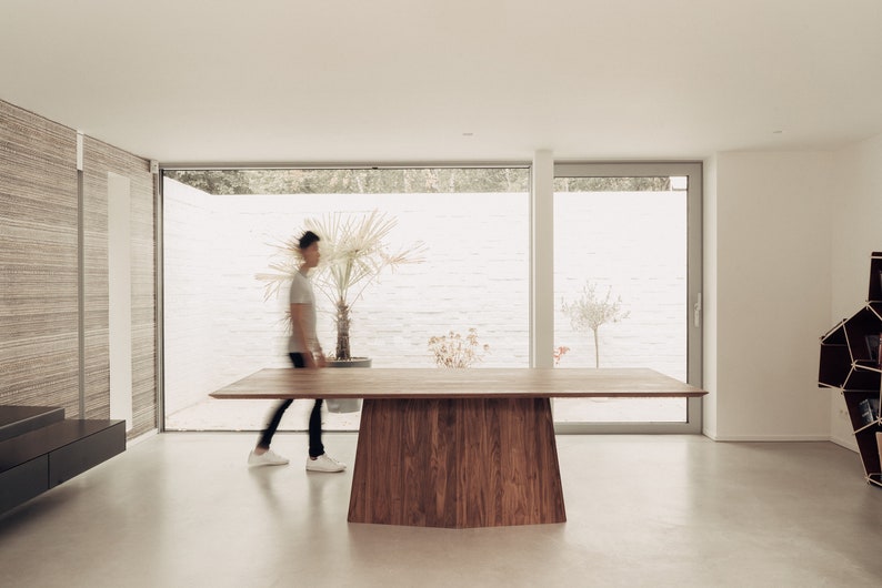 Kluskens 'ADAM' dining table in solid walnut image 1