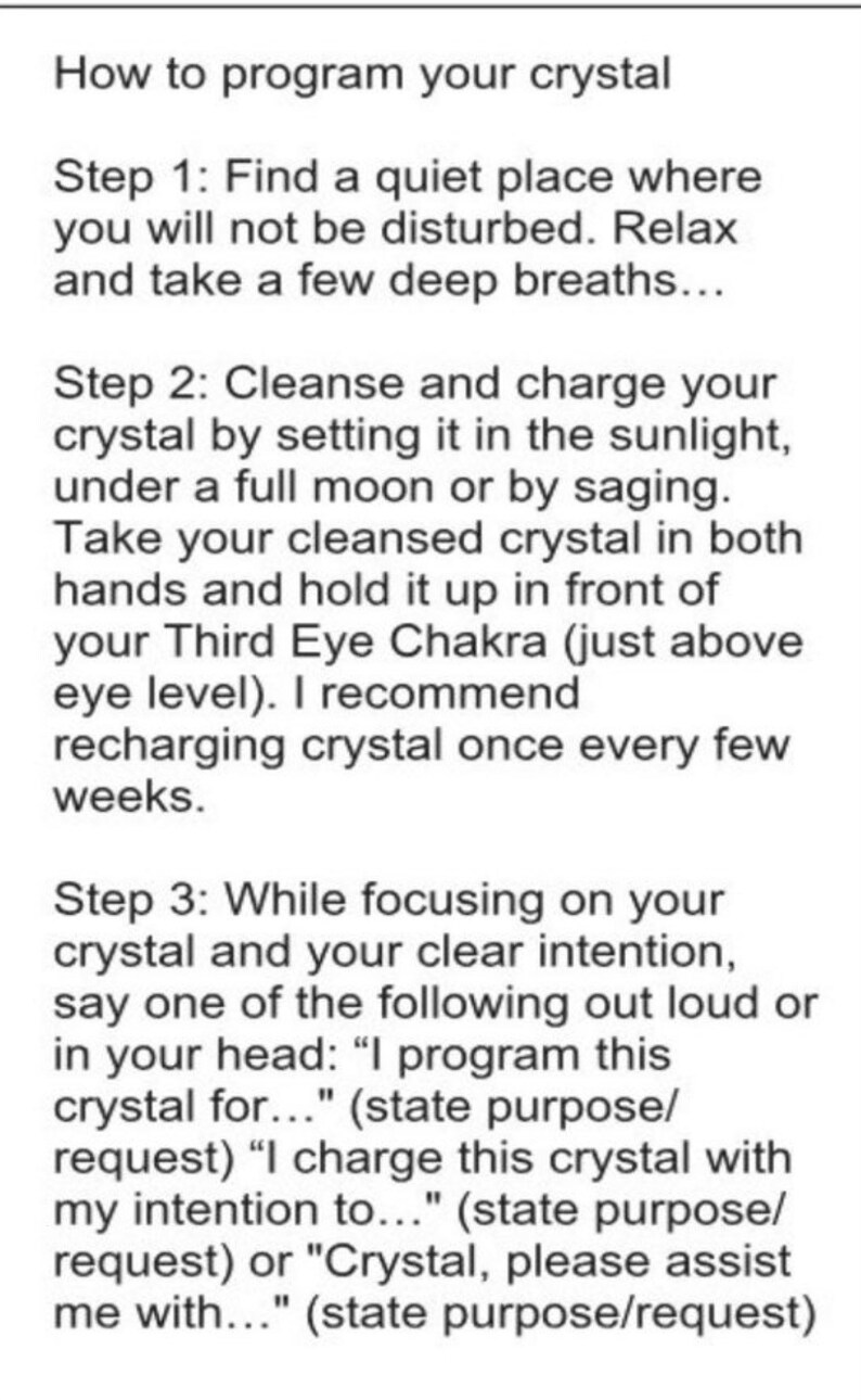 May include: A white background with black text explaining how to program a crystal. The text includes three steps: find a quiet place, cleanse and charge the crystal, and focus on your intention while saying a phrase to program the crystal.