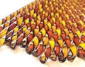 Orange, Red, and Black Glass Twist Cane 96 COE For Fusing, Blowing, Torch work, or Mosaic