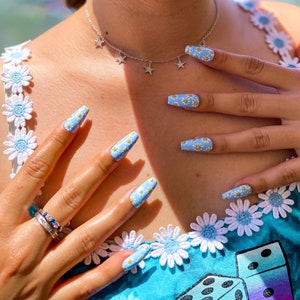 Flower Nail Design. Abstract nail design . Press On Nails. Coffin Nails. Custom Designs. Hand Painted Pressons. PeriwinkNails. Custom Nails