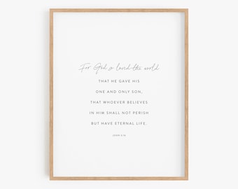 May include: A framed print with a white background and black text. The text reads "For God so loved the world that he gave his one and only son, that whoever believes in him shall not perish but have eternal life. John 3:16".