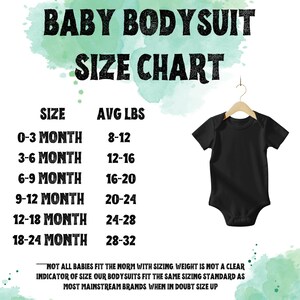May include: A black baby bodysuit hanging on a wooden hanger, next to a size chart. The chart lists sizes from 0-3 months to 18-24 months, with corresponding average weights in pounds. The text "BABY BODYSUIT SIZE CHART" is at the top.