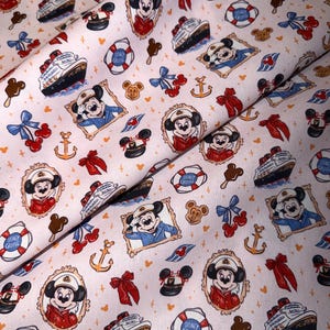 May include: A light pink fabric featuring a repeating pattern of Mickey Mouse in a captain's hat, cruise ships, life preservers labeled Disney Cruise, anchors, red bows, cherries, and brown mouse-shaped ice cream bars on sticks.