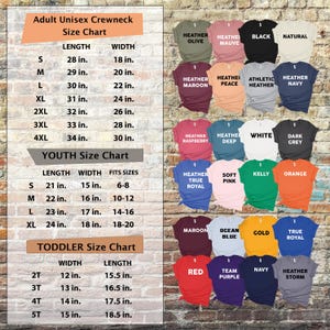 May include: A size chart for adult unisex crewneck, youth, and toddler t-shirts. The chart includes measurements in inches for length and width, along with size ranges. Various t-shirt colors are displayed, including black, navy, and orange.