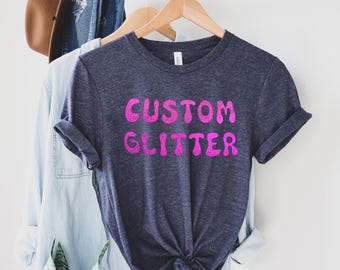 カスタムグリッターTシャツ、パーソナライズグリッターTシャツ、カスタムグリッターTシャツ、カスタムグリッターテキスト、キラキラTシャツ、クリスマスグリッターTシャツ、