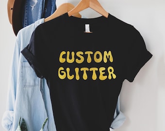 カスタムグリッターTシャツ、パーソナライズグリッターTシャツ、カスタムグリッターTシャツ、カスタムグリッターテキスト、キラキラTシャツ、クリスマスグリッターTシャツ、