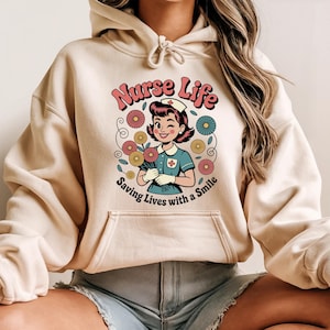 Nurse Life Hoodie with Smile and Flowers, Retro Cartoon Medical Pullover Gift for Cheerful Professionals