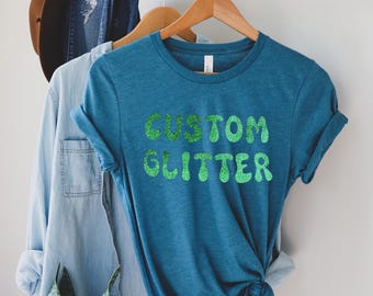 カスタムグリッターTシャツ、パーソナライズグリッターTシャツ、カスタムグリッターTシャツ、カスタムグリッターテキスト、キラキラTシャツ、クリスマスグリッターTシャツ、