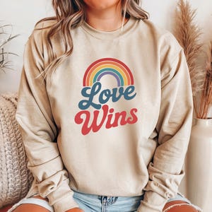 Love Wins Rainbow Sweatshirt, Retro LGBTQ Pride Pullover, Rainbow Equality Graphic, Pride Month Celebration Crewneck