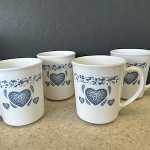Vintage Set of 4 Corningware Blue Hearts D handle Great condition