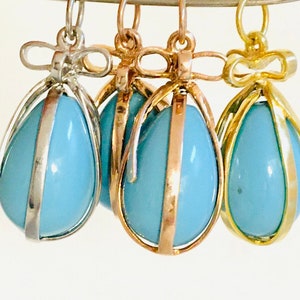 Lovely egg pendant wrapped with silver 925o, gold plated. Available in lapis lazuli, turquoise, opal rose colours.