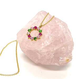 Multi color sapphires, rubies & tsavorites on a circular pendant tied on a 18k solid gold long chain.Anniversary -Promise romantic necklace.