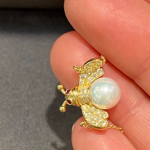 18k solid gold bee necklace with white diamonds, ruby & one pearl under, gift bringing fertility.