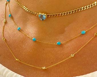14k yellow gold 90s style choker necklace with a heart-shaped blue topaz. Valentines - Holidays 2024 gift for protection, self-realization.
