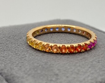 18k rose gold multi color natural sapphire eternity ring. Rainbow sapphire gold ring bringing good fortune & creativity.