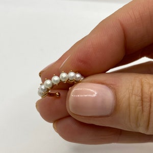 18k solid gold single cuff earring with nine fresh water pearls. June's birthstone jewellery present custom made in MELIGreece's workshop.