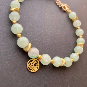 Bransoletka z jadeitu i złotych koralików