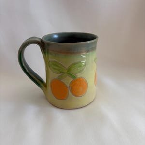 Tazza in ceramica intagliata a mano, motivo arance testurizzate, capacità 11 once