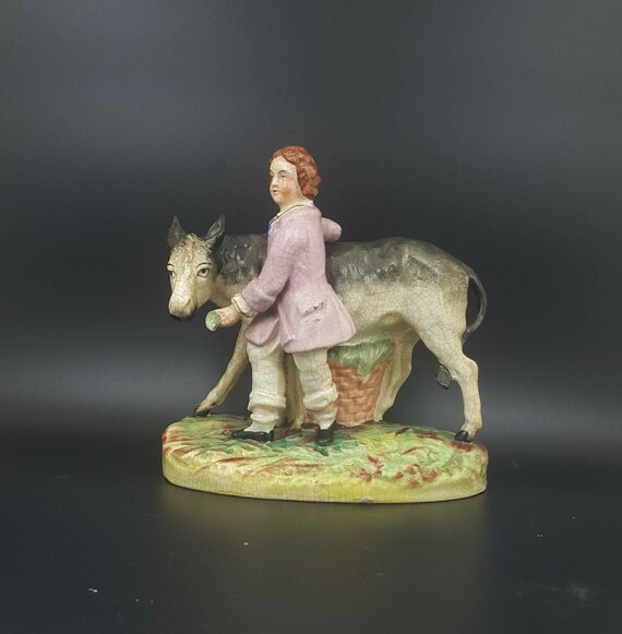 Staffordshire Figurine Man Cleaning Donkey