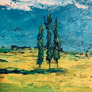 May include: A painting of a landscape with three green trees in the foreground and a blue sky with white clouds in the background.