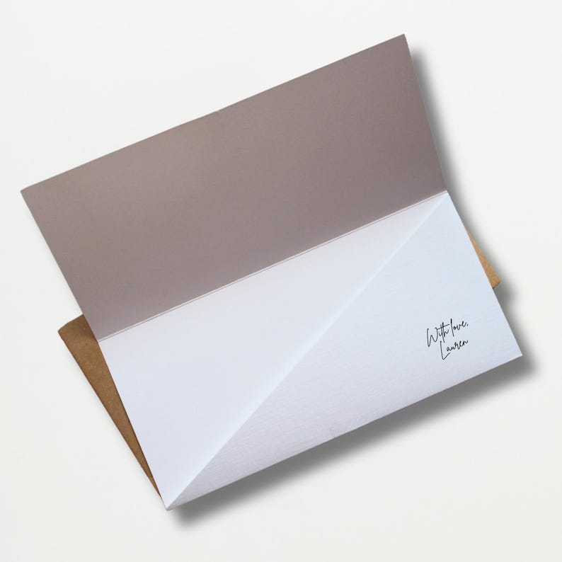 a close up of an envelope on a white surface