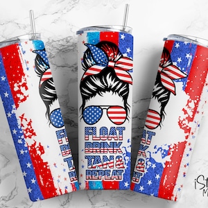 May include: A white tumbler with a red, white, and blue American flag design. The tumbler features a woman with a messy bun wearing sunglasses and a red, white, and blue headband. The text "FLOAT DRINK TAN & REPEAT" is printed on the tumbler.